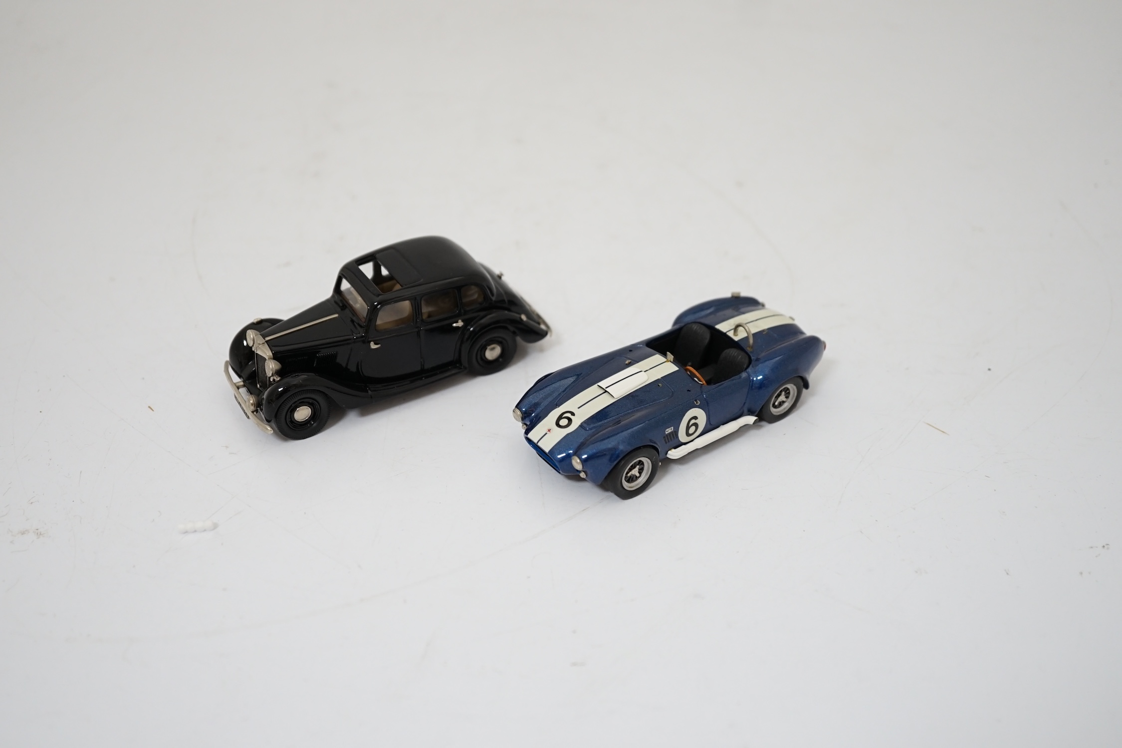 Twenty boxed diecast, white metal, etc. model vehicles including; a Lansdowne Models MG Saloon Type ‘YA’, and an unboxed S.M.T.S. white metal A.C. cobra, two Scalextric cars; a Bentley (C305) and an Alfa-Romeo (C306), th